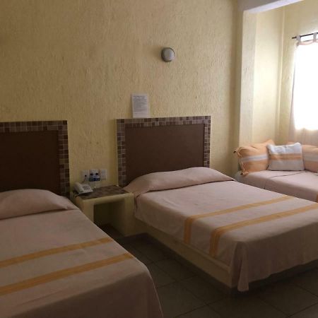 Hotel Maria Mixteca Санта-Крус-Хуатулко Экстерьер фото