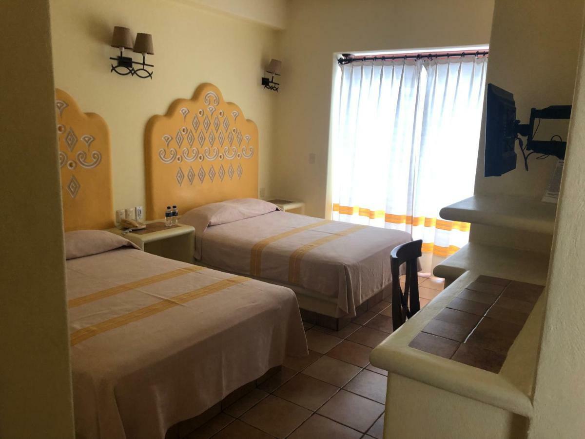 Hotel Maria Mixteca Санта-Крус-Хуатулко Экстерьер фото